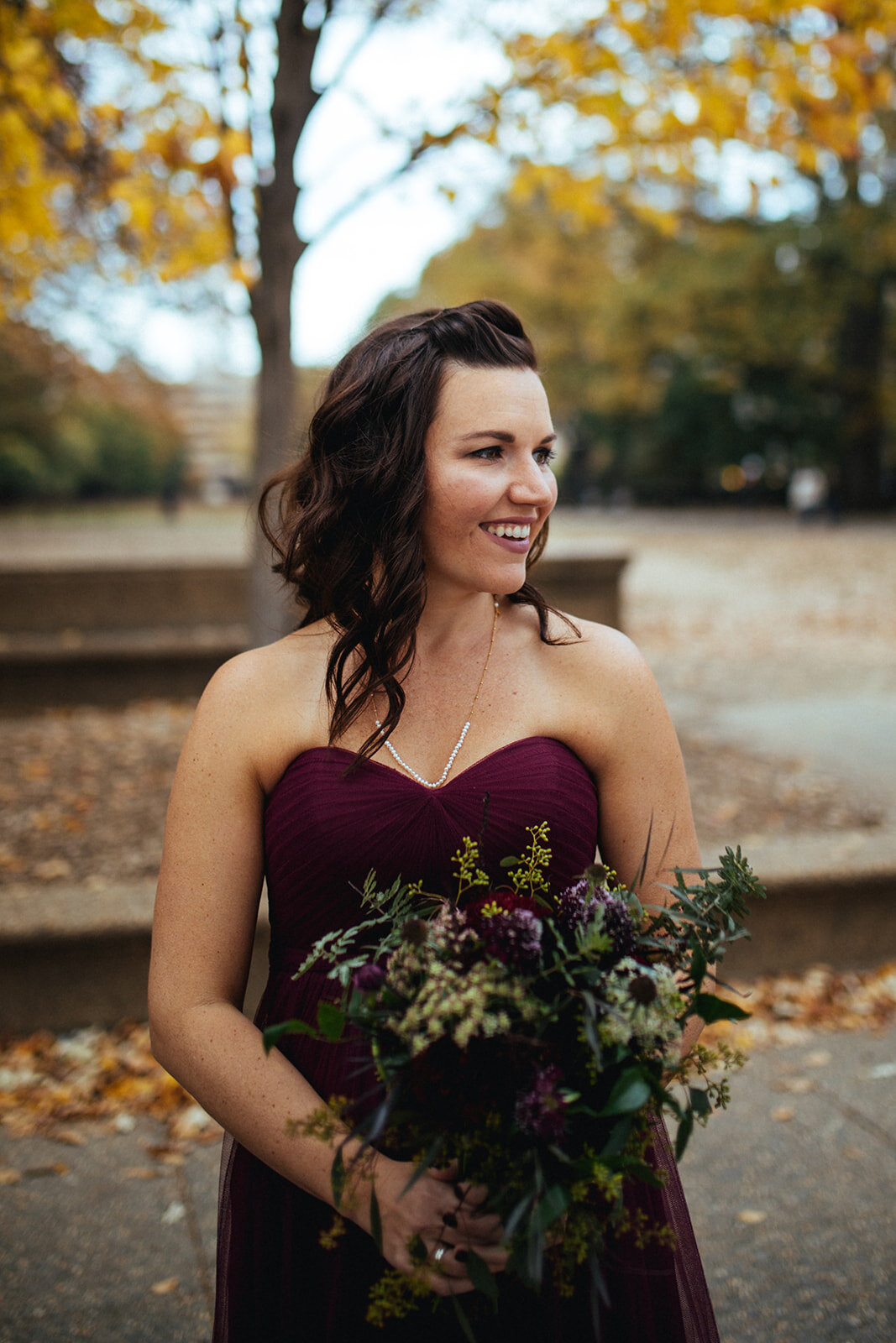 Bridesmaid with bouquet in DC Shawnee Custalow wedding photography