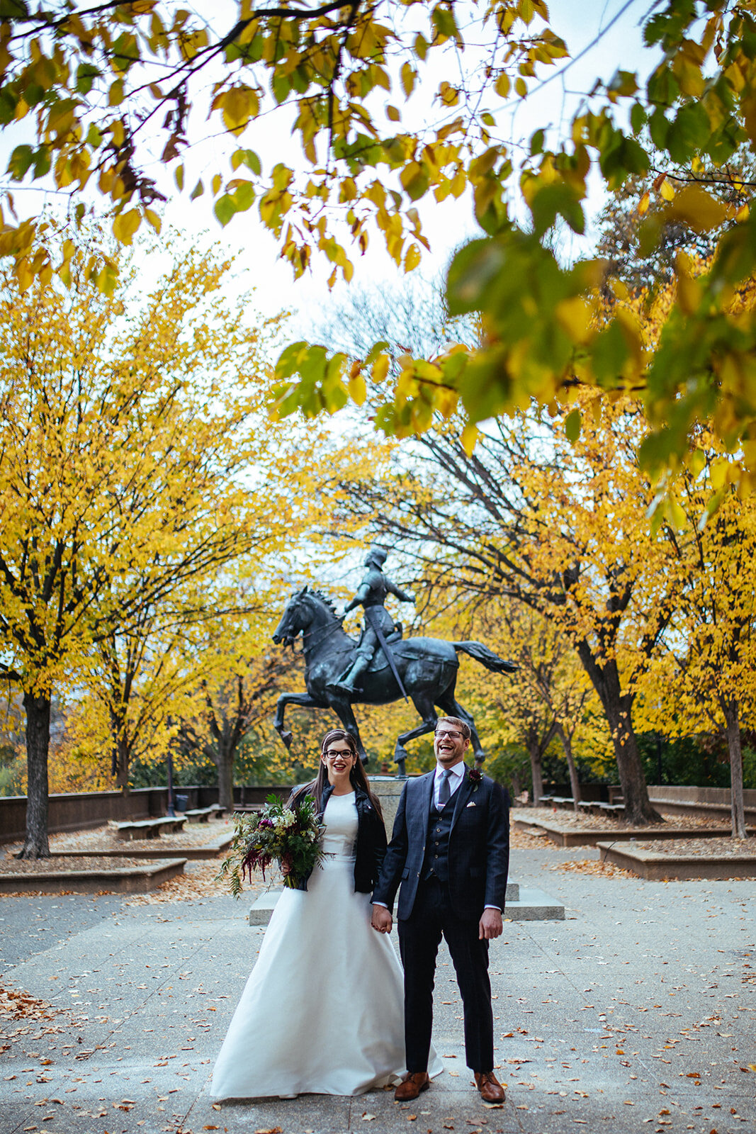Bride and groom holding hands in DC Shawnee Custalow photography