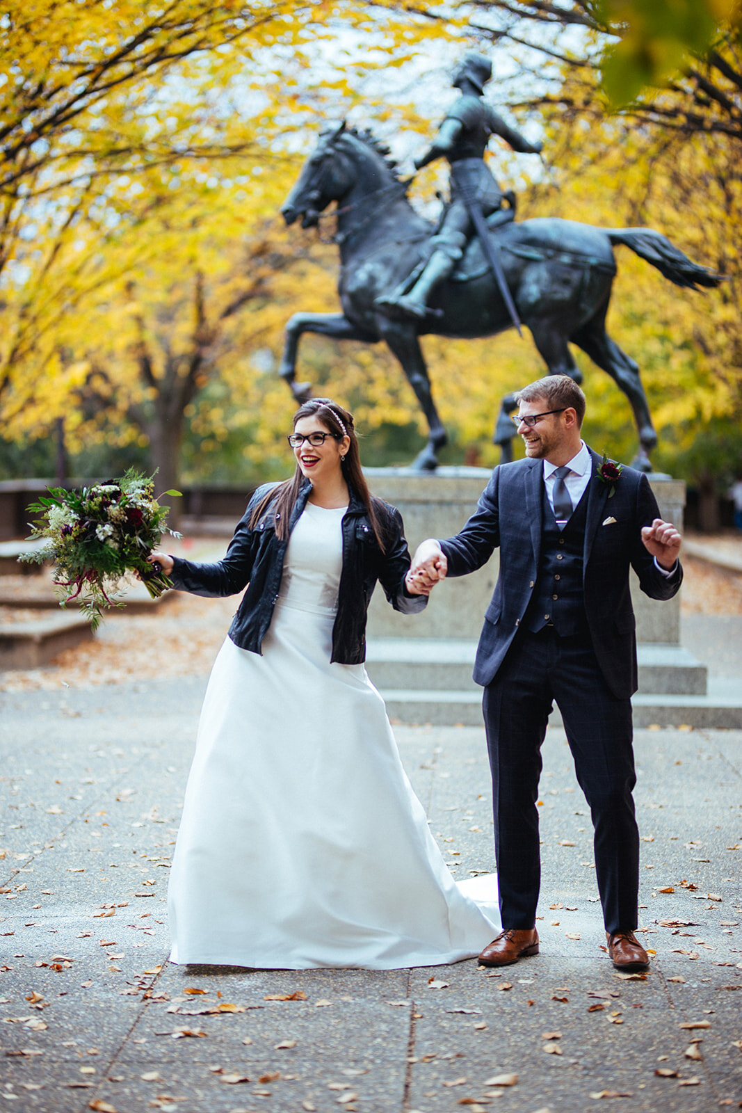Bride and groom holding hands in DC Shawnee Custalow photography