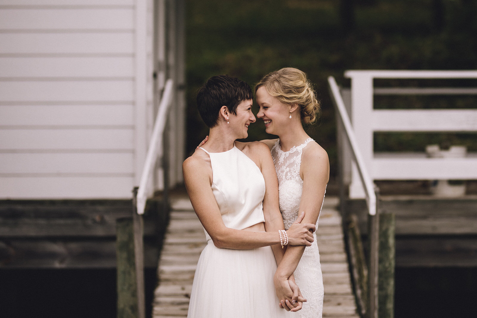 LGBTQ brides embracing in central VA Shawnee Custalow photography