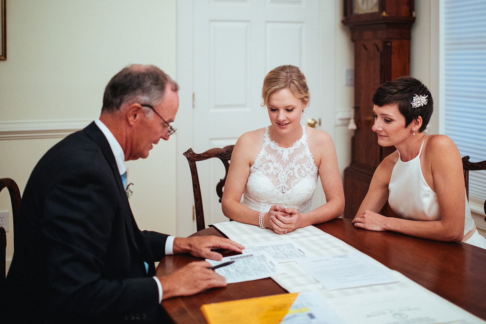 Newlyweds sign marriage paperwork in VA Shawnee Custalow photography