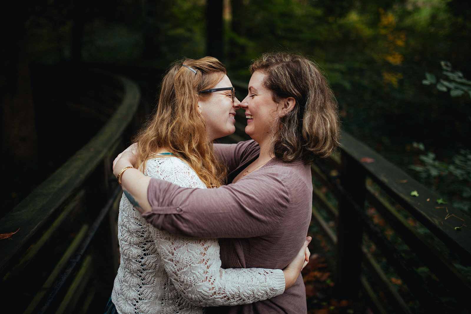 LGBTQ couple lean in to kiss in Forest Hill Park Richmond VA Shawnee Custalow photography