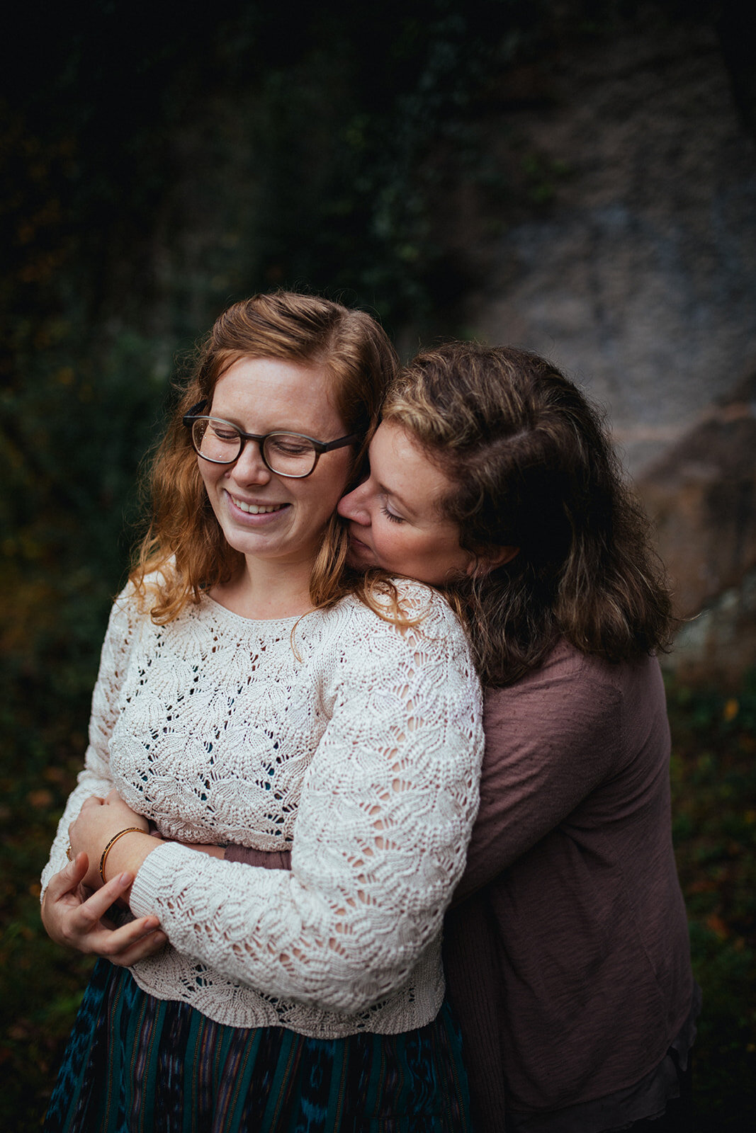 Engaged queer couple embracing in Richmond VA Shawnee Custalow photography