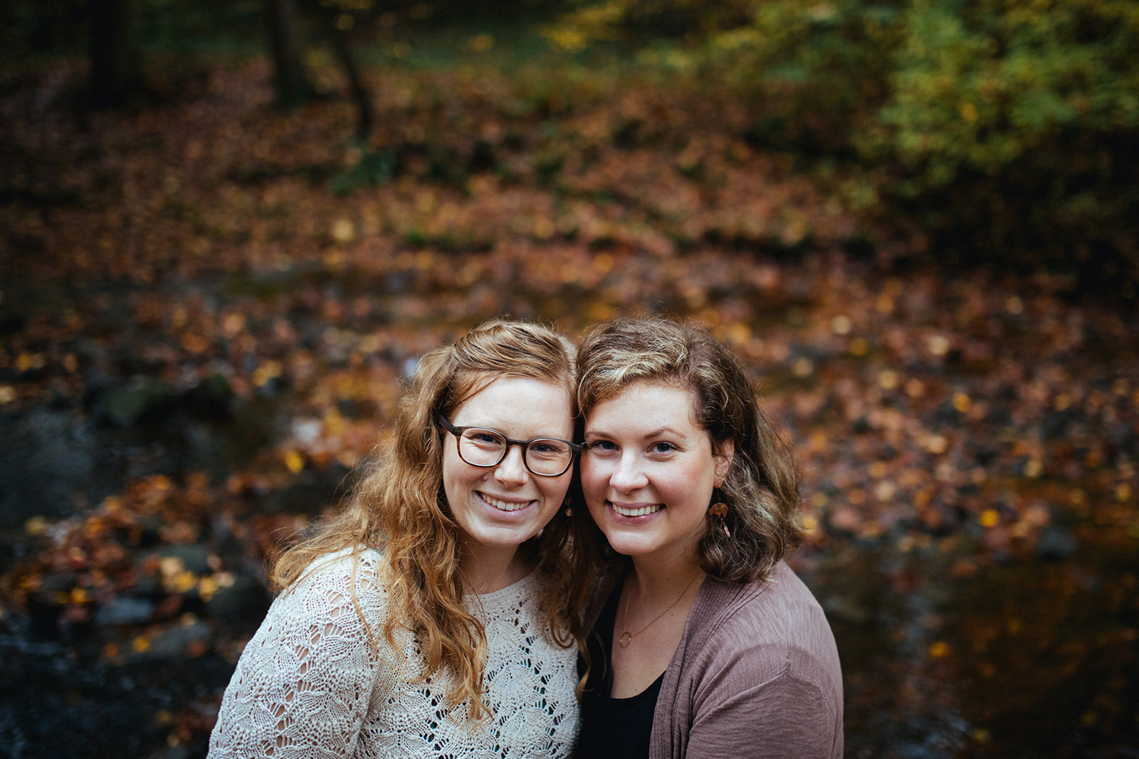 LGBTQ engaged couple smiling at Forest Hill Park Richmond VA Shawnee Custalow photography