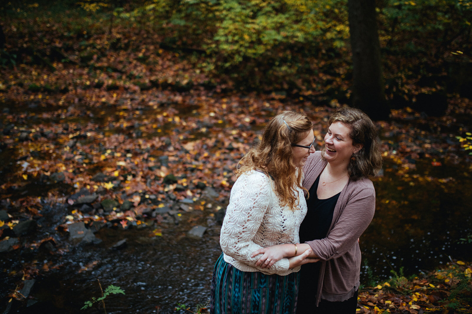 LGBTQ engaged couple laughing at Forest Hill Park RVA Shawnee Custalow photography