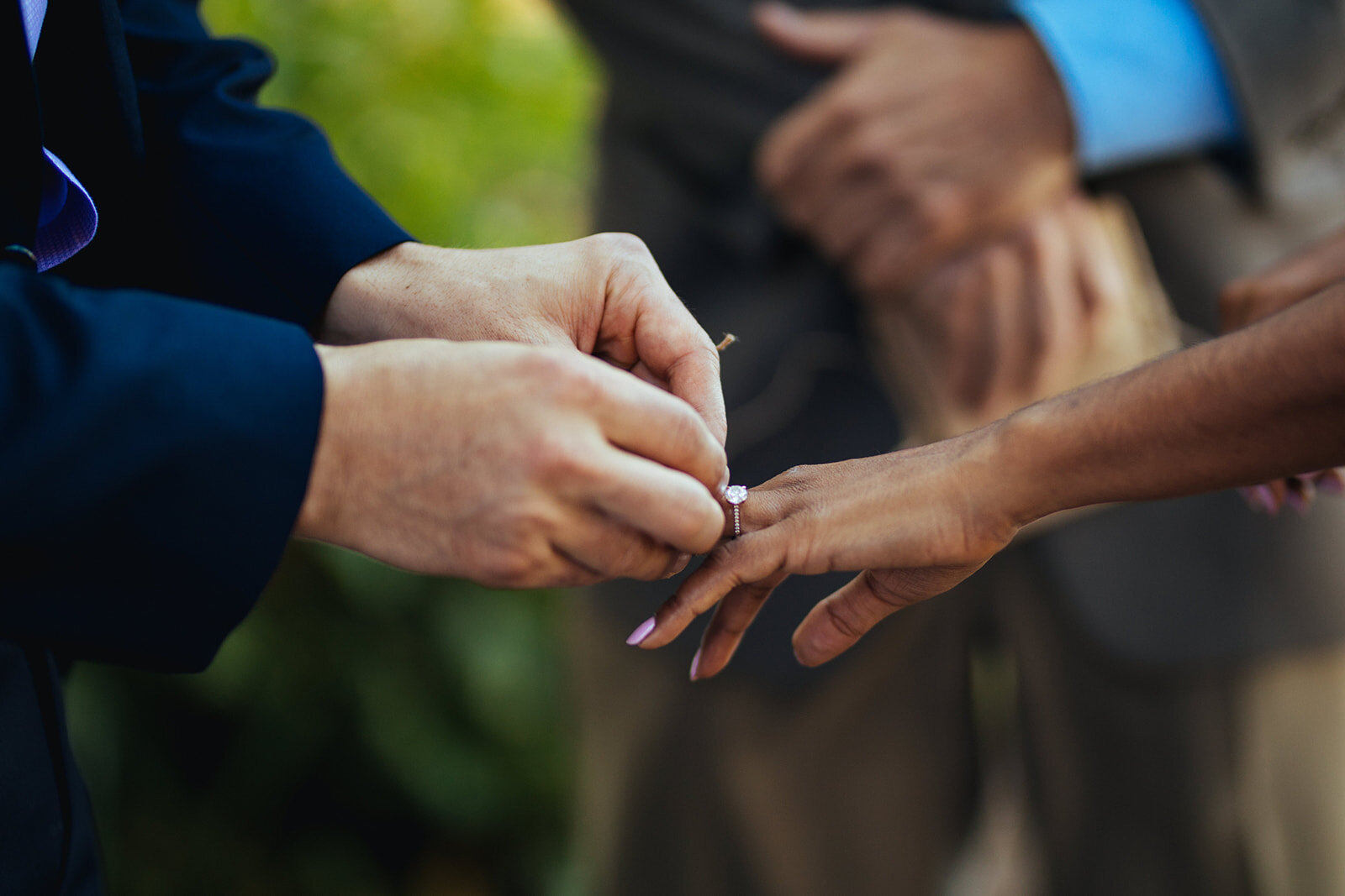 Spouses exchanging rings in San Francisco CA Shawnee Custalow photography