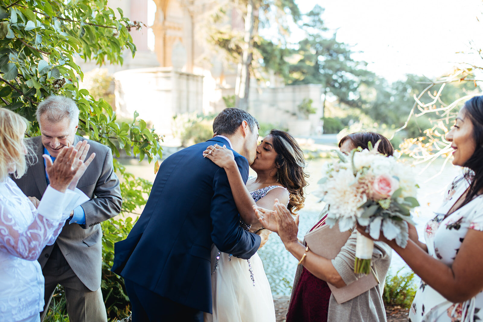 Newlyweds kissing at the Palace of Fine Arts San Francisco Shawnee Custalow