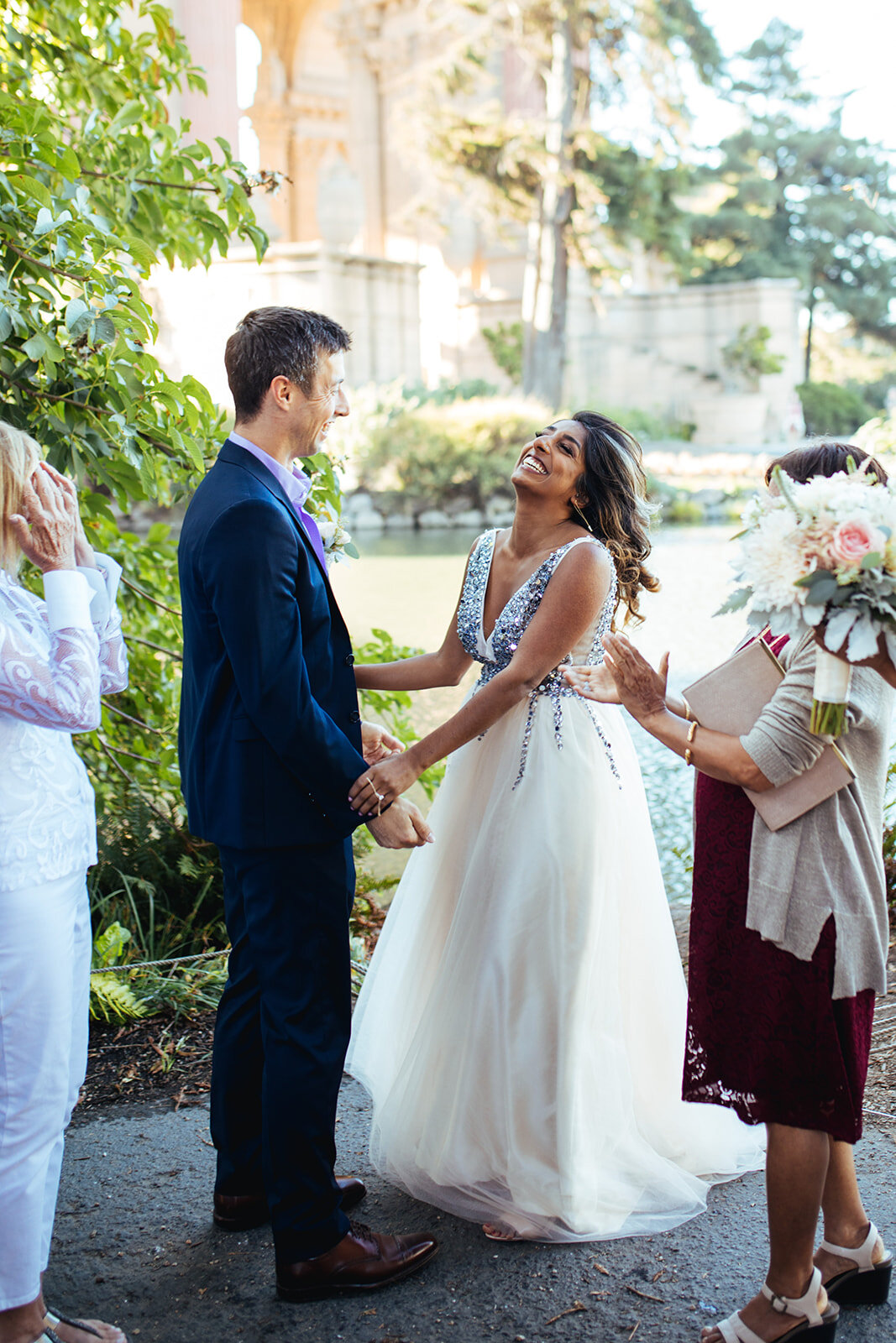 Happy newlyweds at the Palace of fine arts CA Shawnee Custalow photography