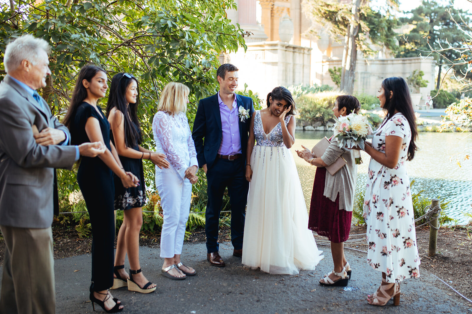 Wedding party gathered at the palace of fine arts California Shawnee Custalow