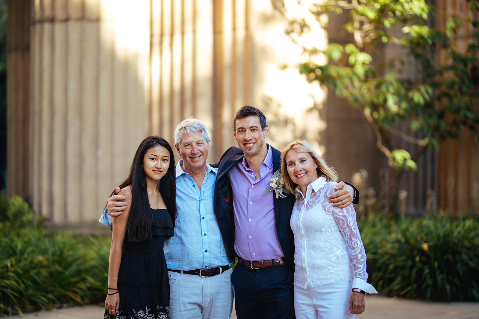Groom with family in San Francisco CA Shawnee Custalow Queer Wedding Photography