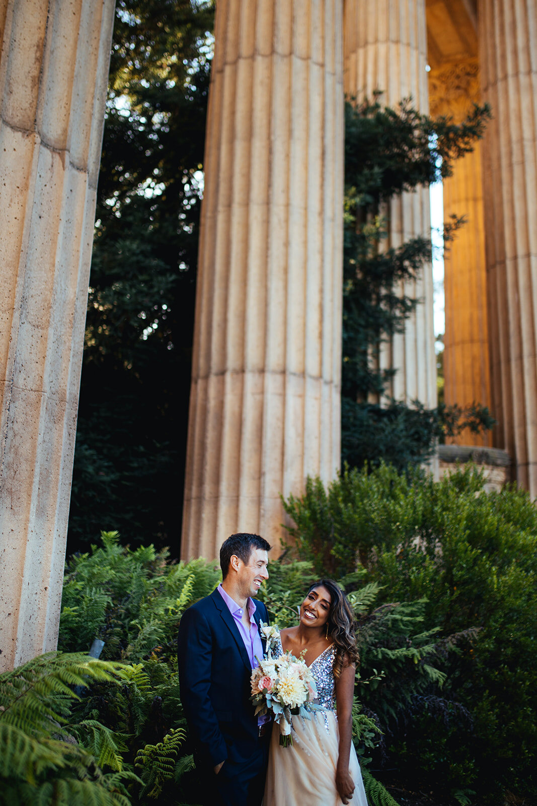 Happy newlyweds at the Palace of Fine Arts CA Shawnee Custalow Photography