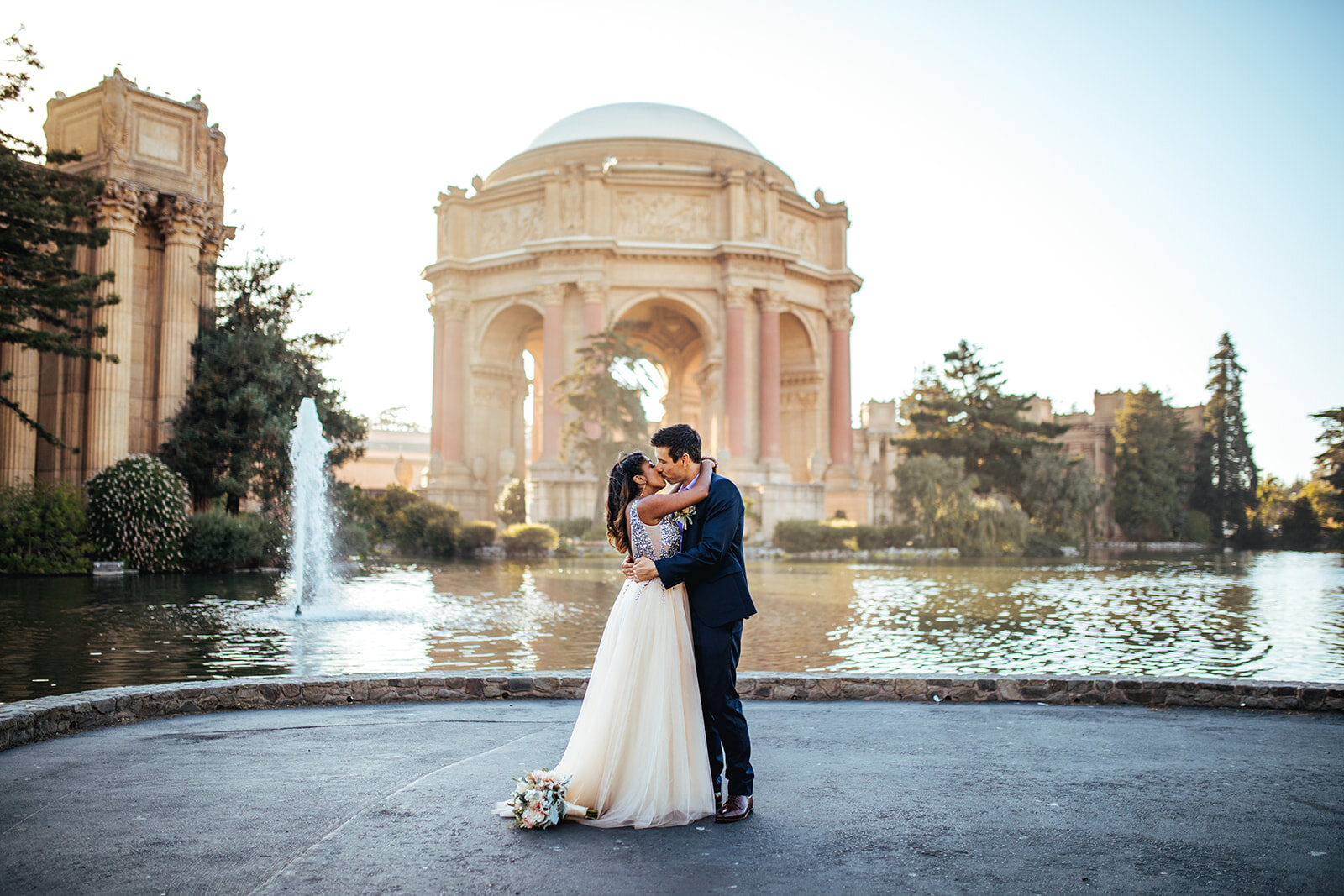 Newlyweds kissing at the Palace of Fine Arts Shawnee Custalow photography