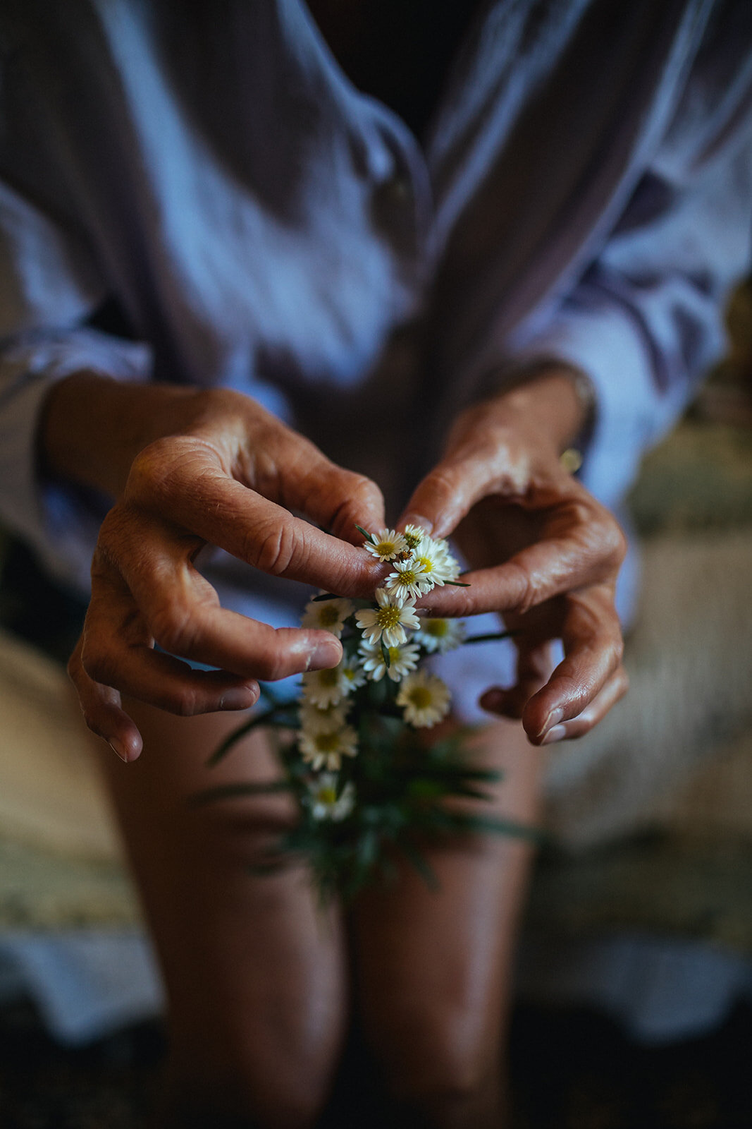 Hands with flowers in Cape Cod Shawnee Custalow wedding photography