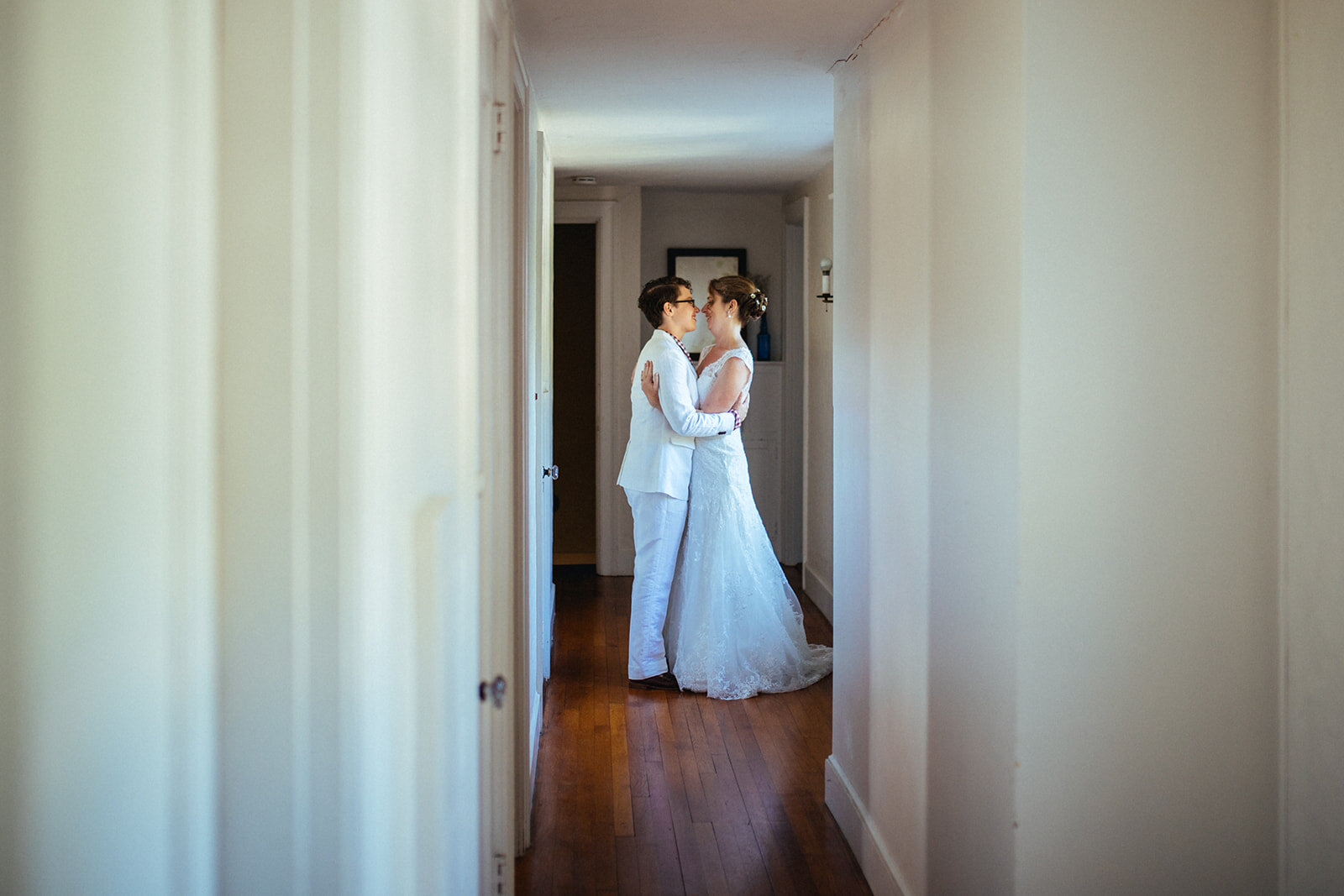 Future spouses embrace in Cape Cod home Shawnee Custalow photography