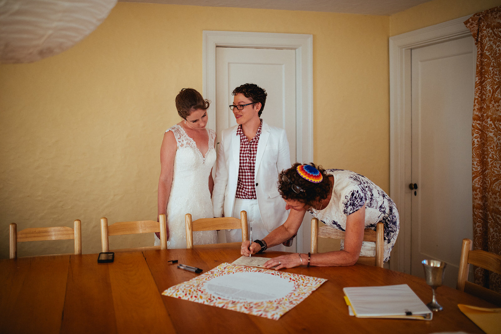 Couple with officiant in Cape Cod Shawnee Custalow wedding photography