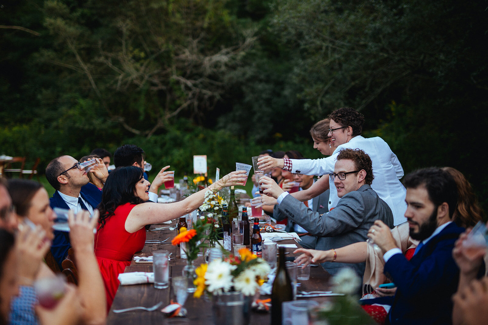 Wedding guests toasting in Cape Cod Shawnee Custalow photography