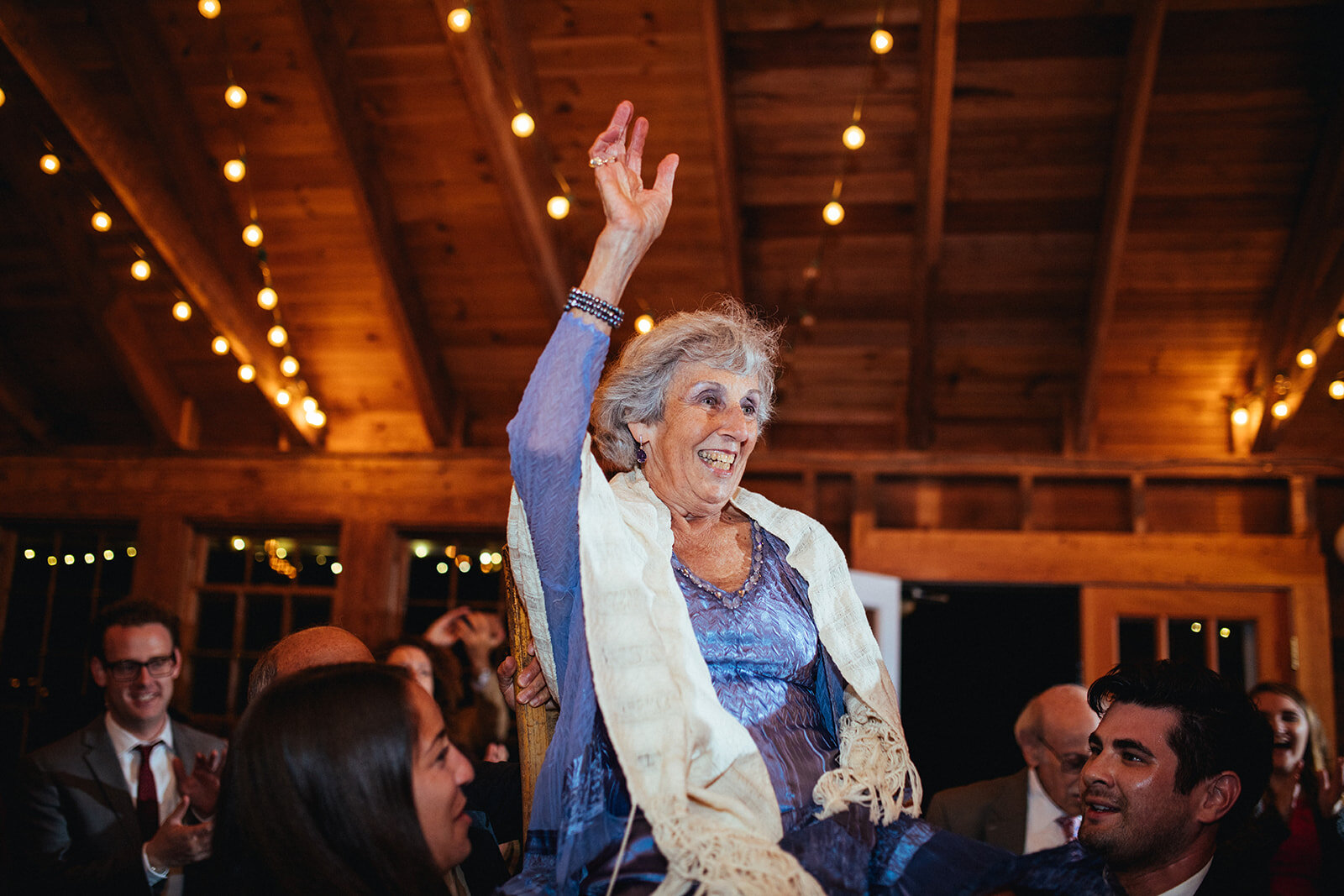 Wedding guests dance the horah in Cape Cod Shawnee Custalow photo