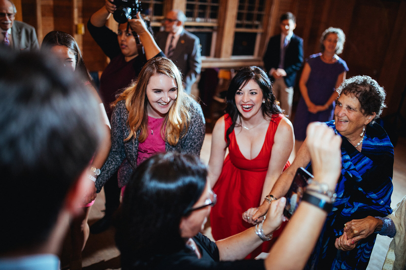 Wedding guests dance the horah in Cape Cod Shawnee Custalow photo