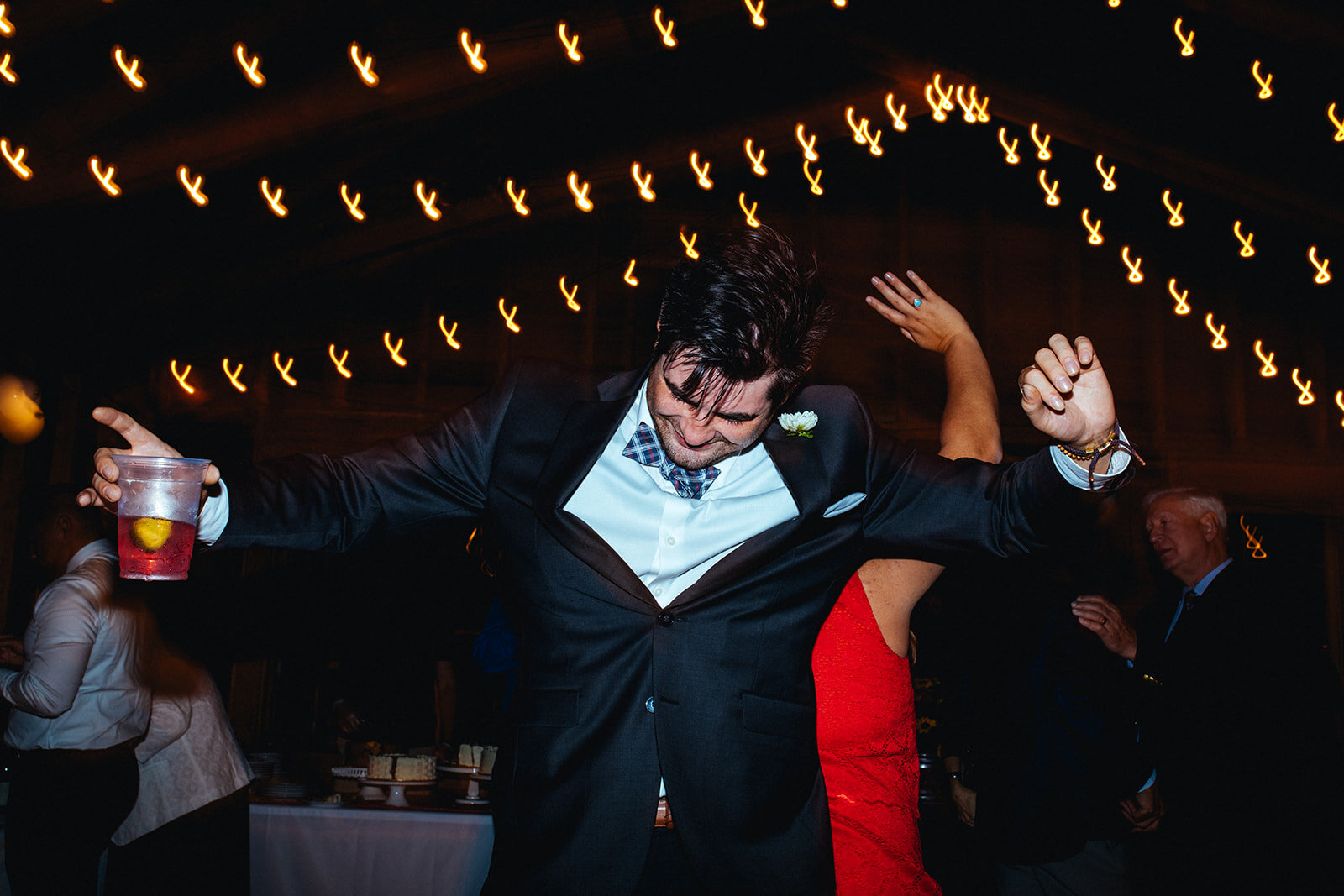 Wedding guest dancing in Cape Cod Shawnee Custalow photography