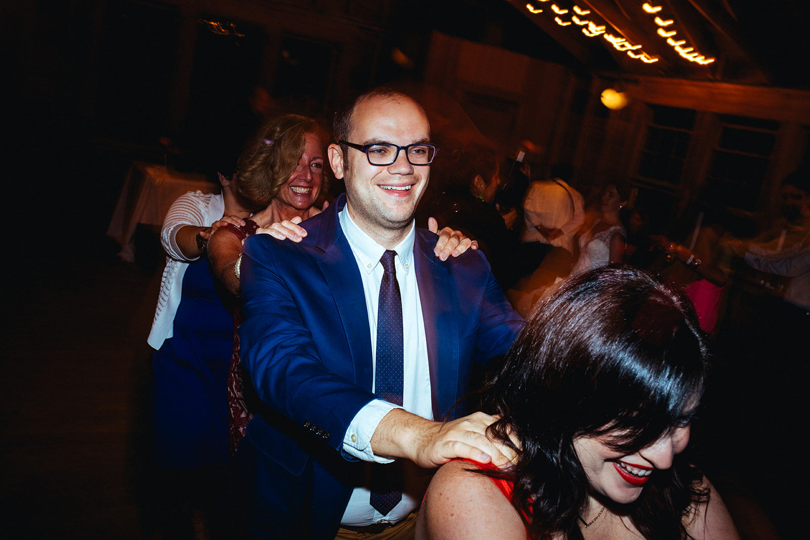 Wedding guests dancing in Cape Cod Shawnee Custalow photography