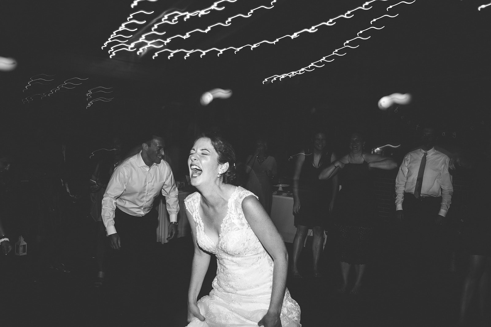 Newlywed laughing at Cape Cod reception Shawnee Custalow photography