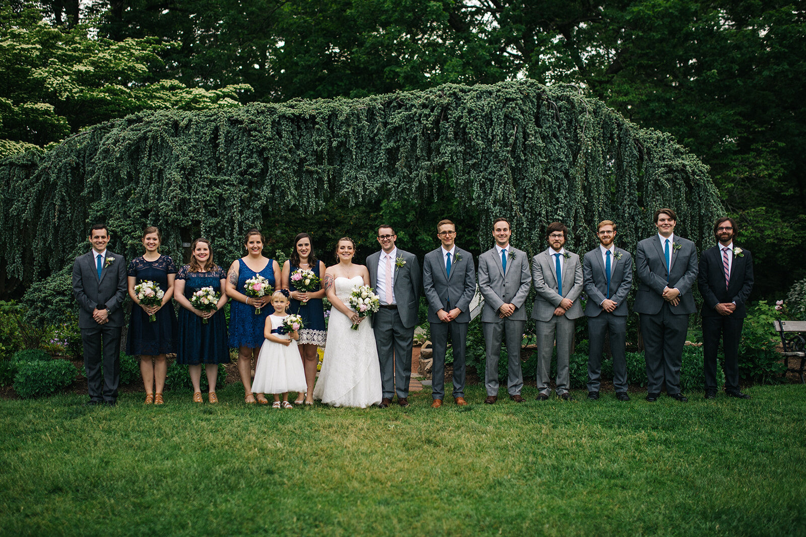Newlyweds with wedding party at Elizabeth Park Conservatory Shawnee Custalow