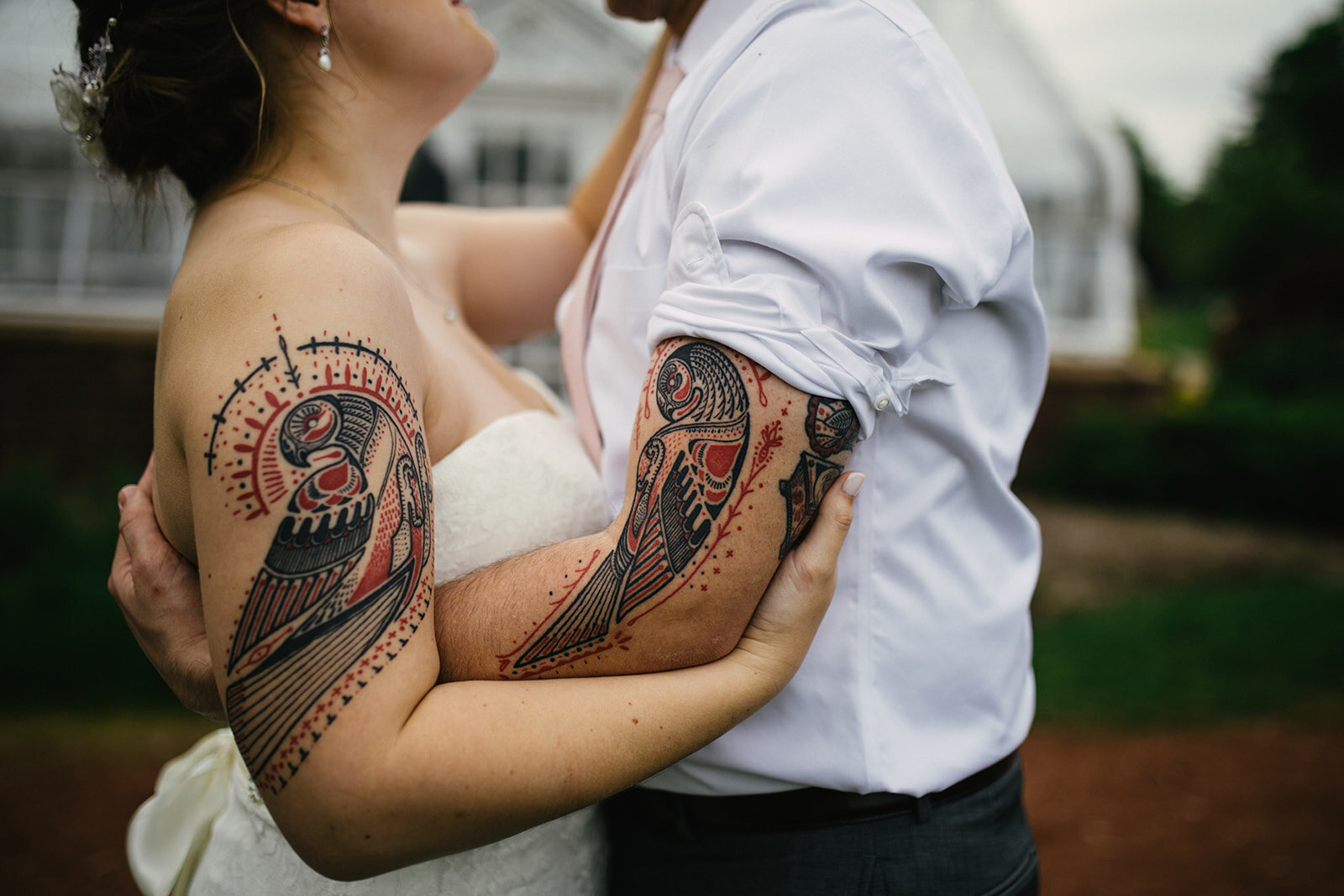 Newlyweds with tattoos at Elizabeth Park Conservatory Shawnee Custalow