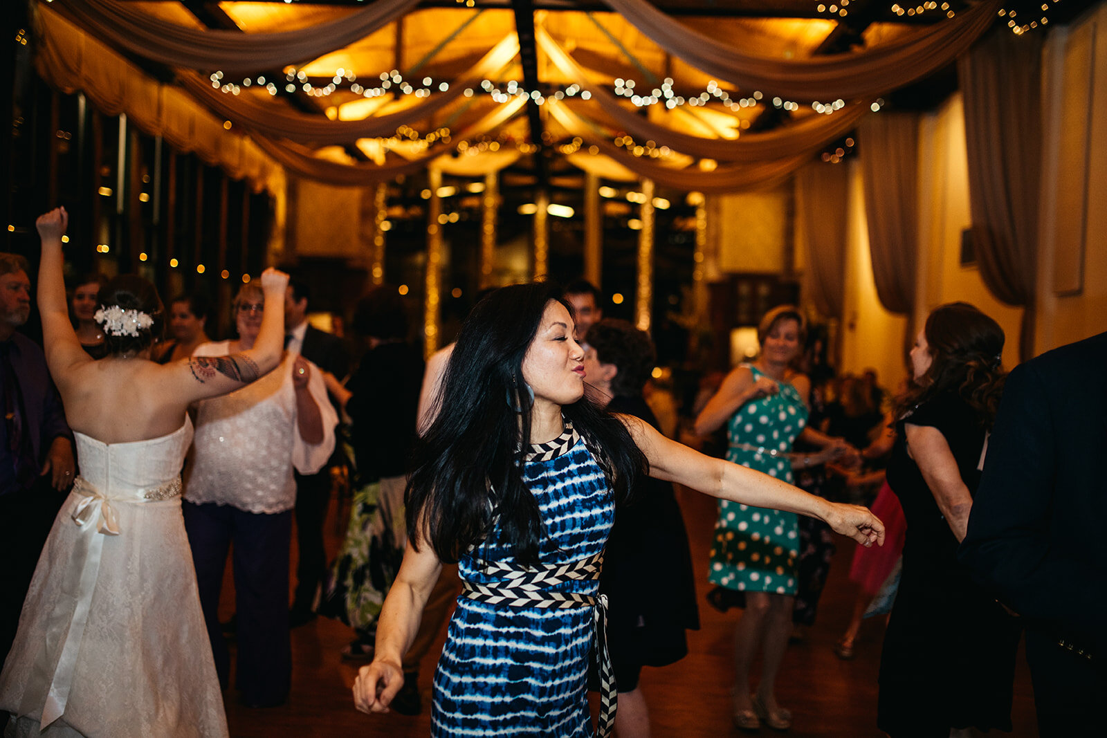 Wedding guests dancing at Elizabeth Park Conservatory Shawnee Custalow