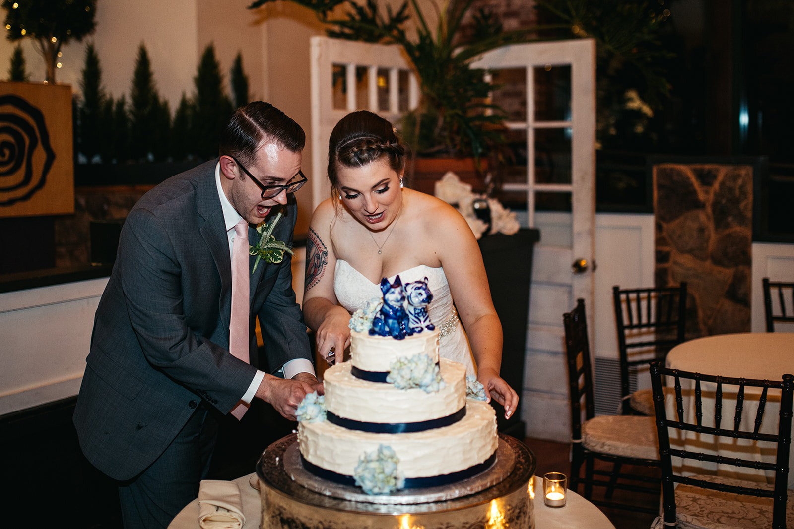 Newlyweds cutting the cake in Hartford CT Shawnee Custalow photography