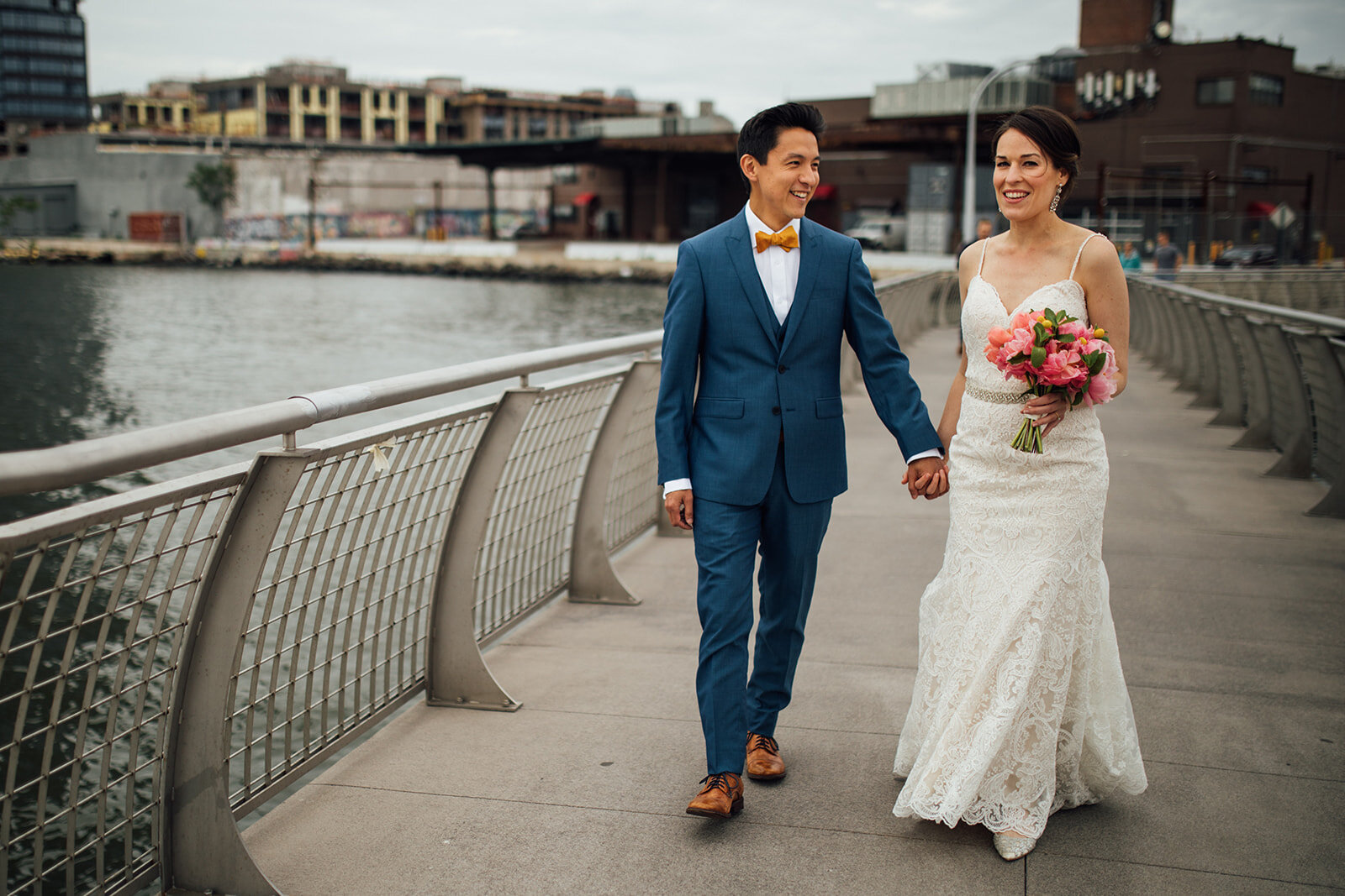 Future spouses walking hand in hand in Brooklyn NY Shawnee Custalow wedding photography