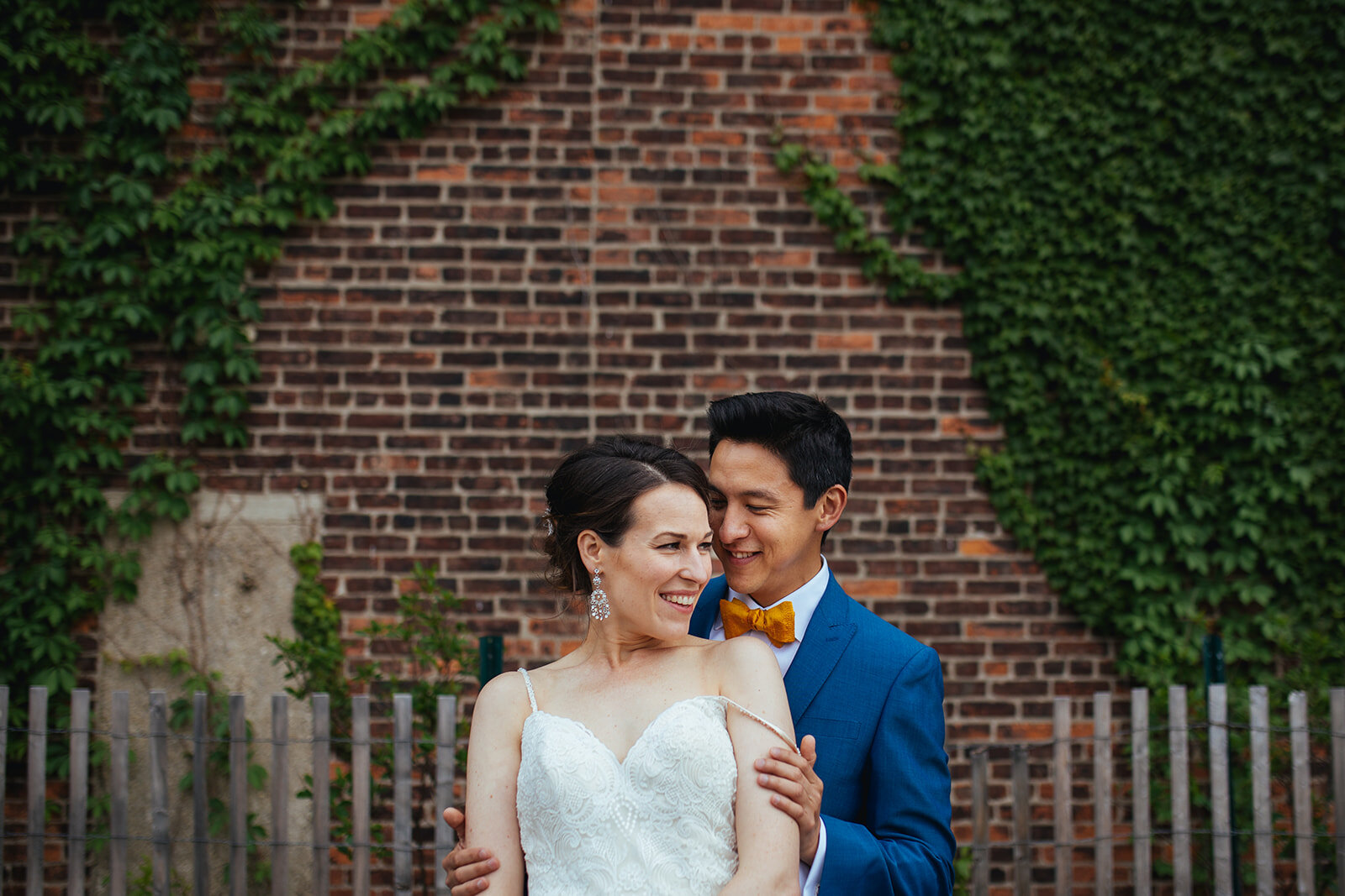 Future spouses embracing in Brooklyn NY Shawnee Custalow wedding photography