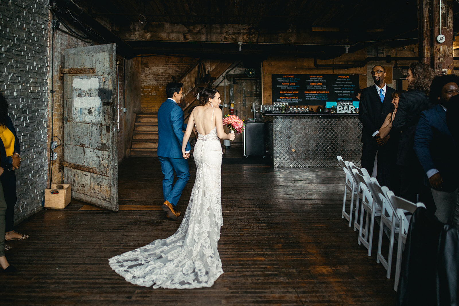Groom and bride with a long train at the Greenpoint Loft NY Shawnee Custalow photography