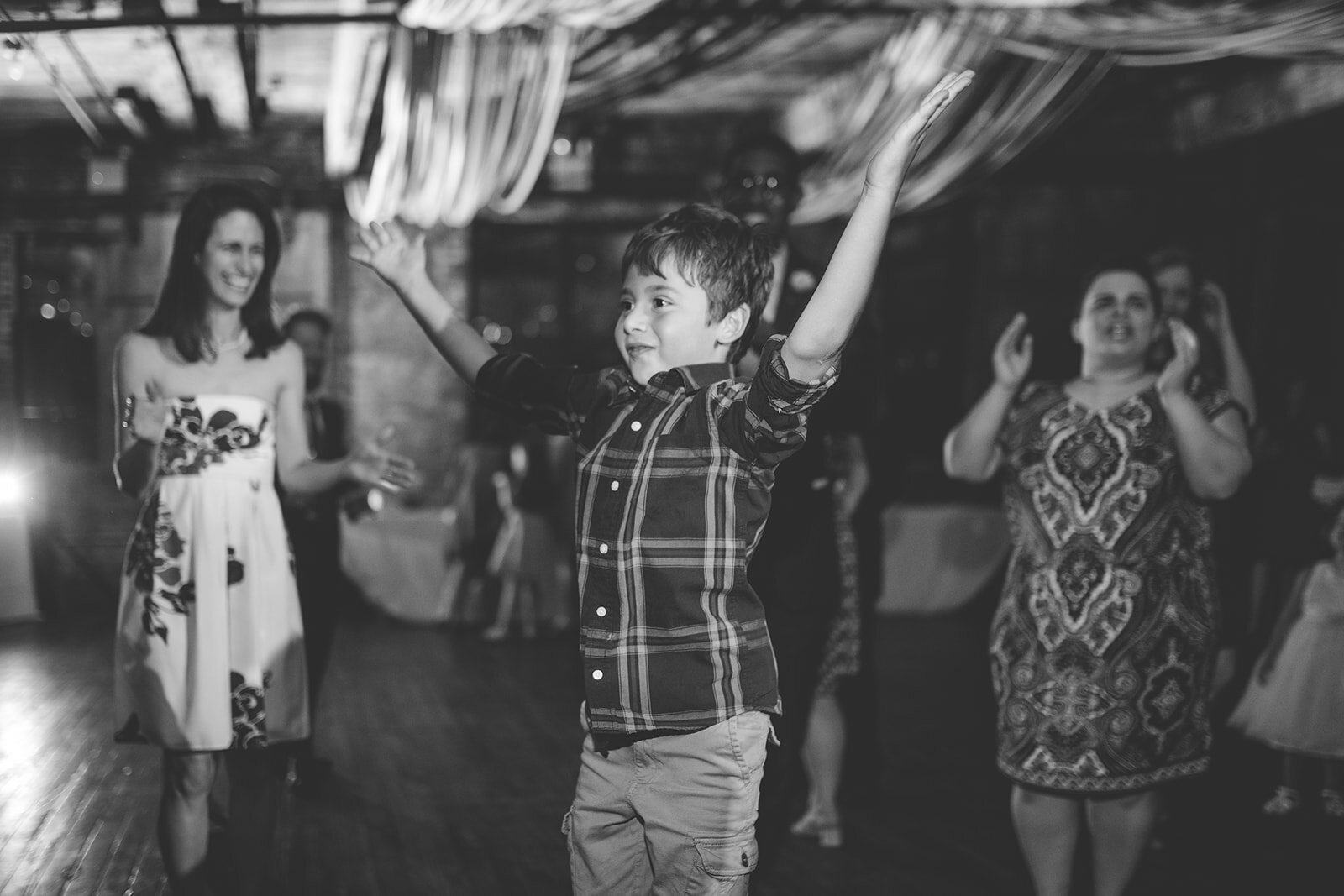 Child dancing at the Greenpoint Loft Wedding Brooklyn NYC Shawnee Custalow photography