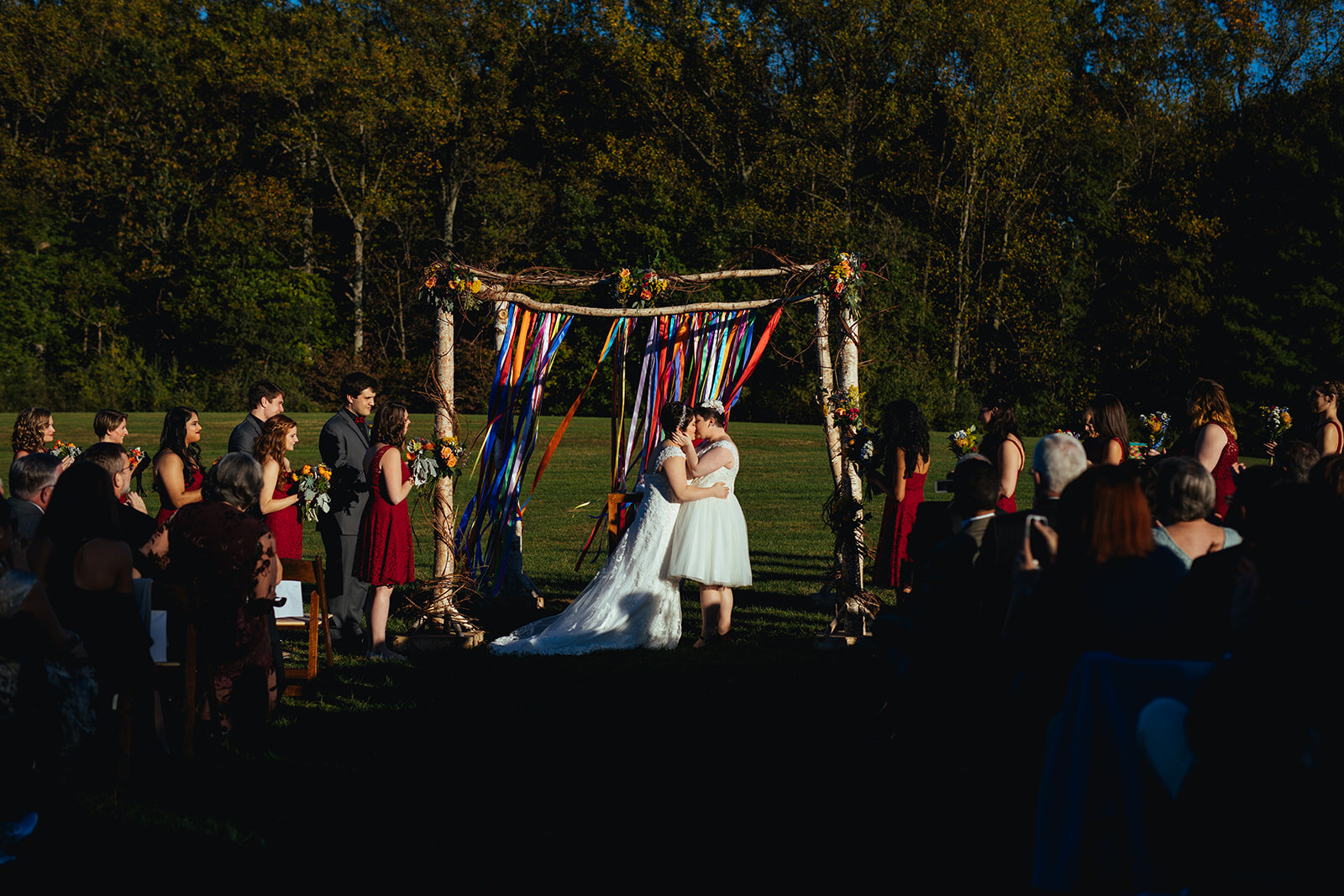 LGBTQ newlyweds kissing at a ceremony near DC Shawnee Custalow photography