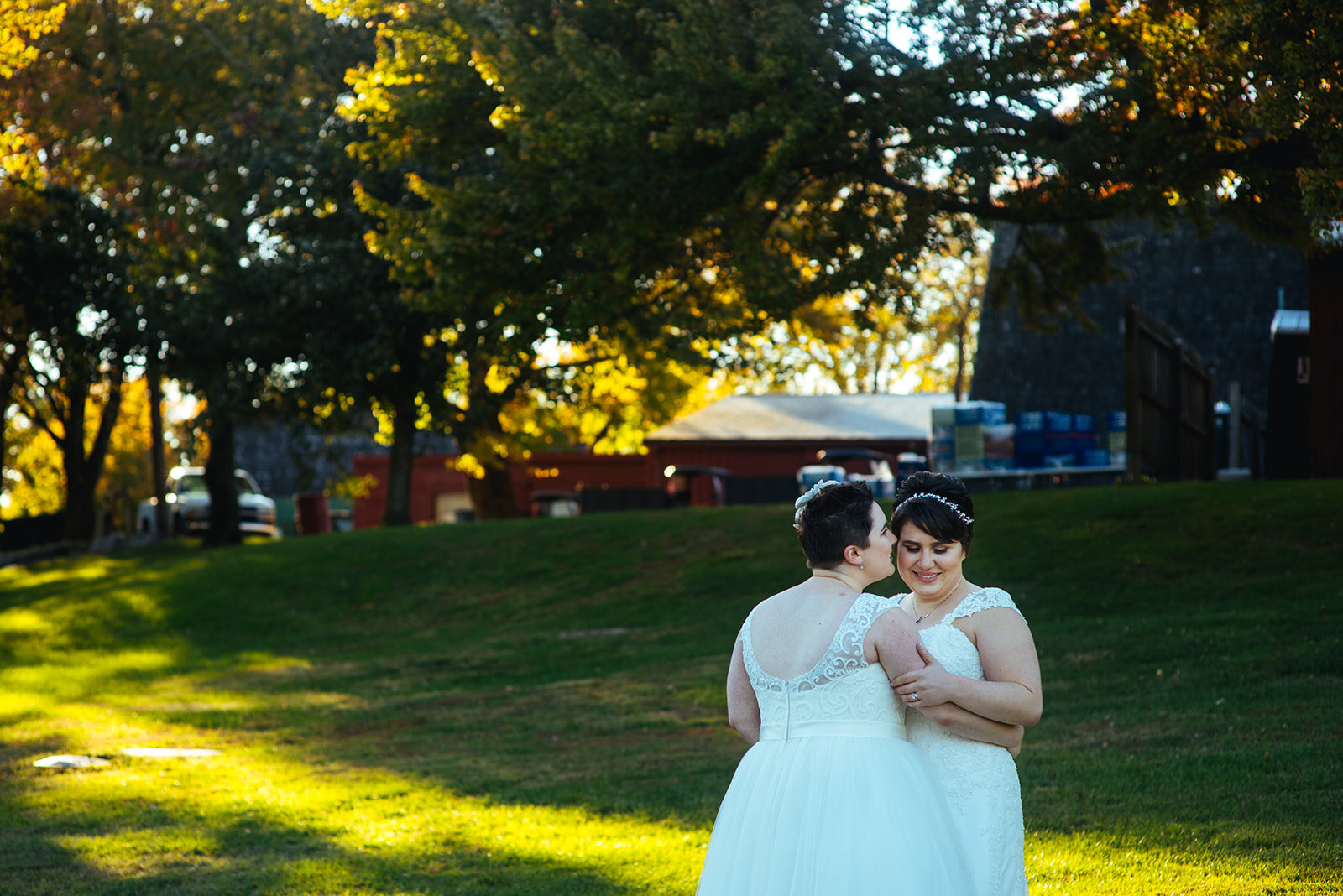 Newlyweds embracing in Gaithersburg MD Shawnee Custalow queer wedding photography