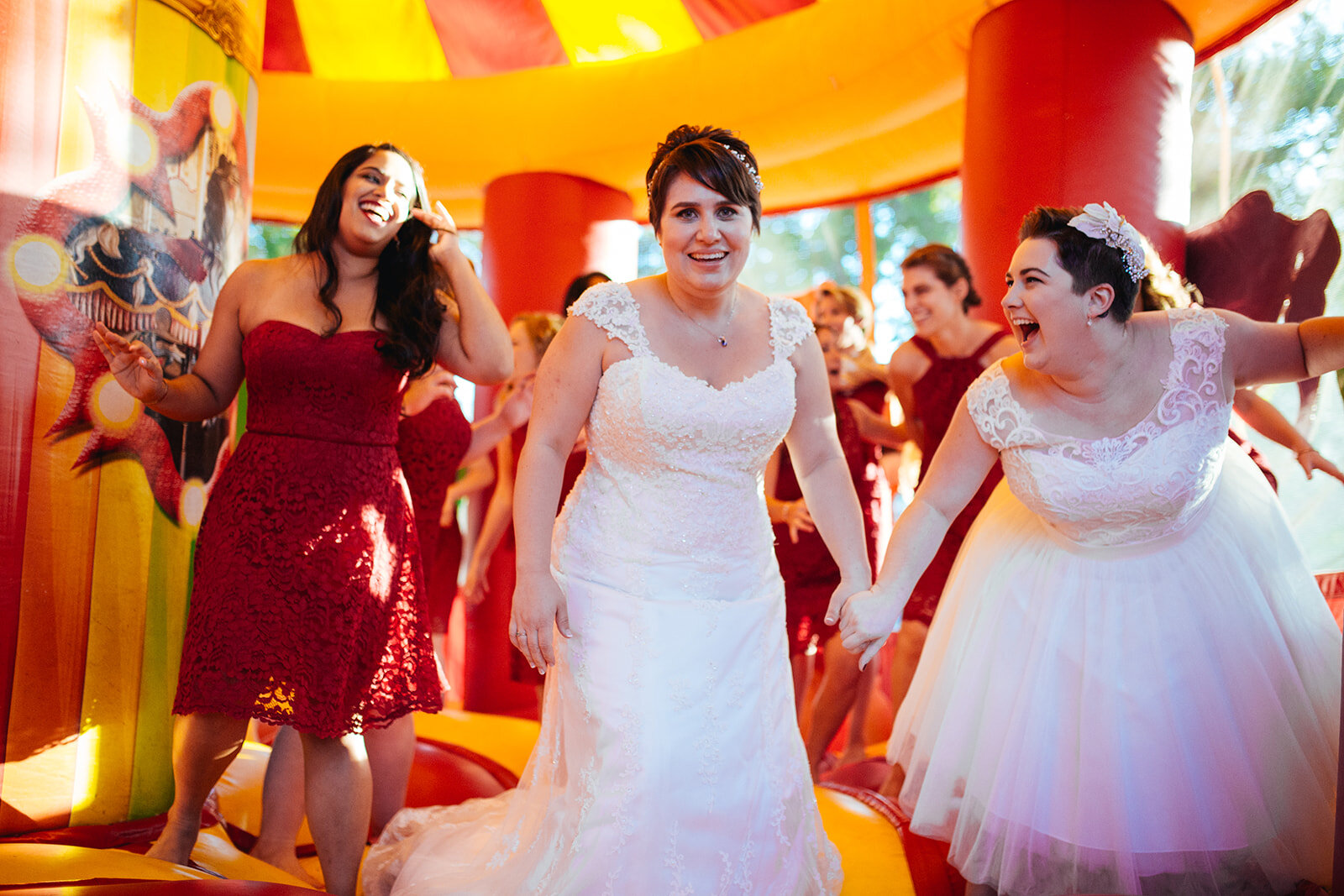 Wedding party in a bounce house near DC Shawnee Custalow queer wedding photography