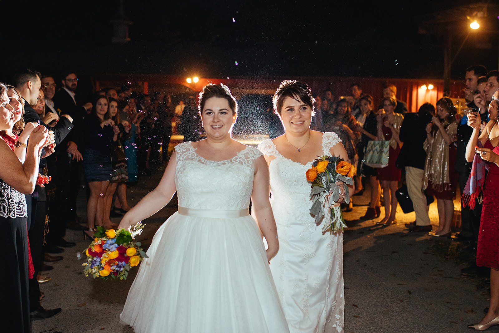 LGBTQ newlyweds exiting Gaithersburg MD wedding Shawnee Custalow photography