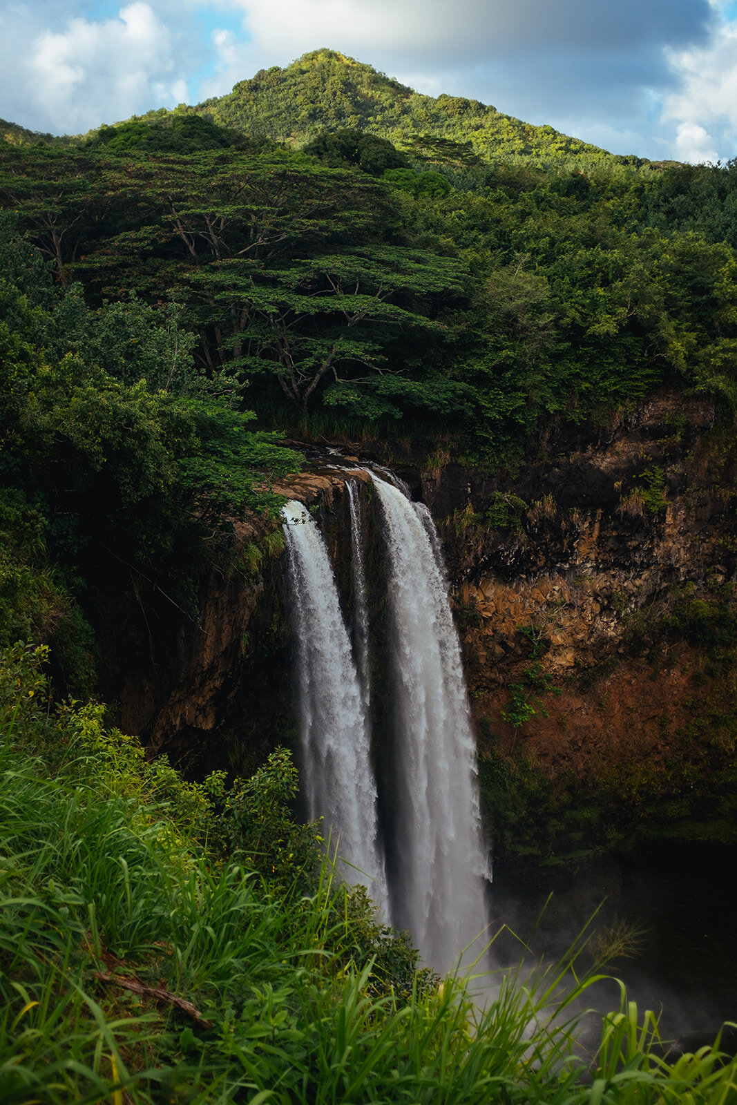 Mountain waterfall in Kauai Hawaii Shawnee Custalow queer wedding photographer