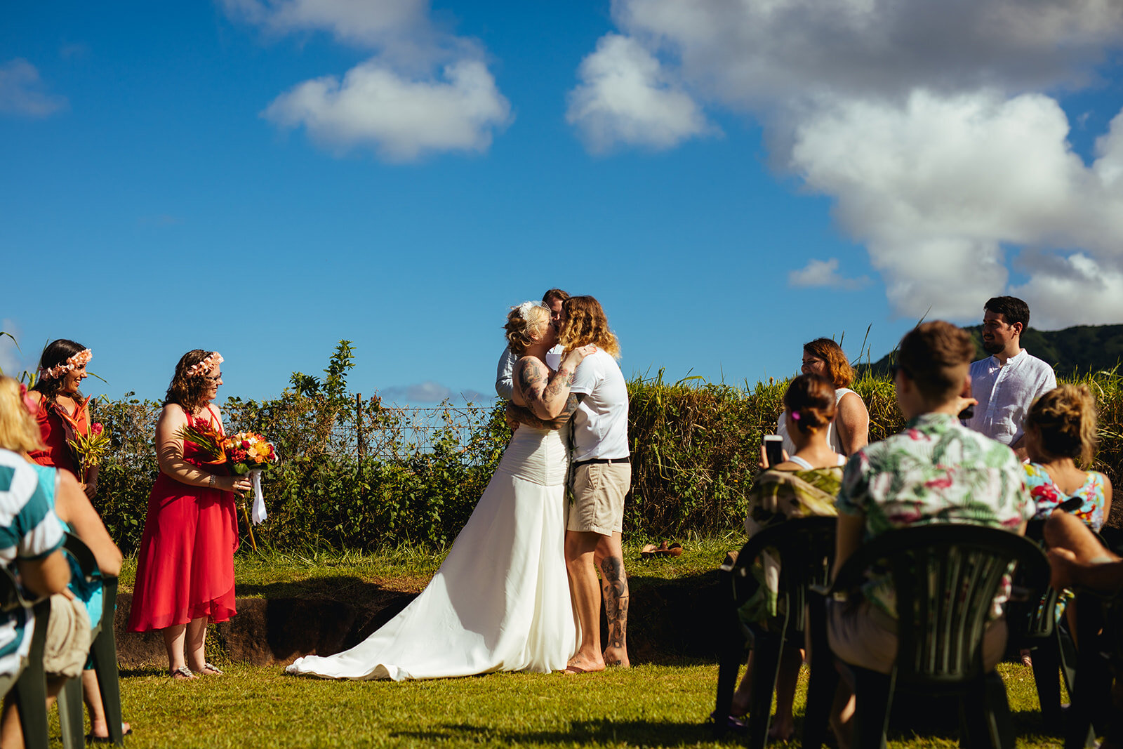 Newlyweds kissing at Kauai Hawaii wedding Shawnee Custalow photography