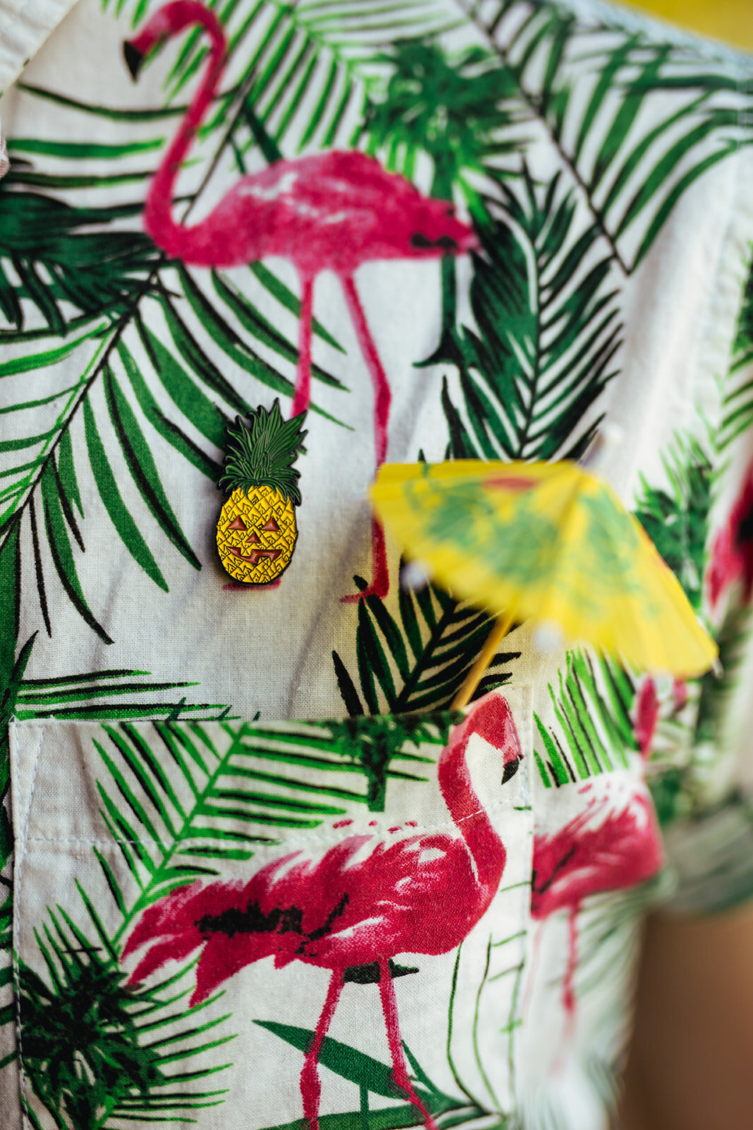 Flamingos shirt with a tiny umbrella in Kauai HI Shawnee Custalow wedding photographer