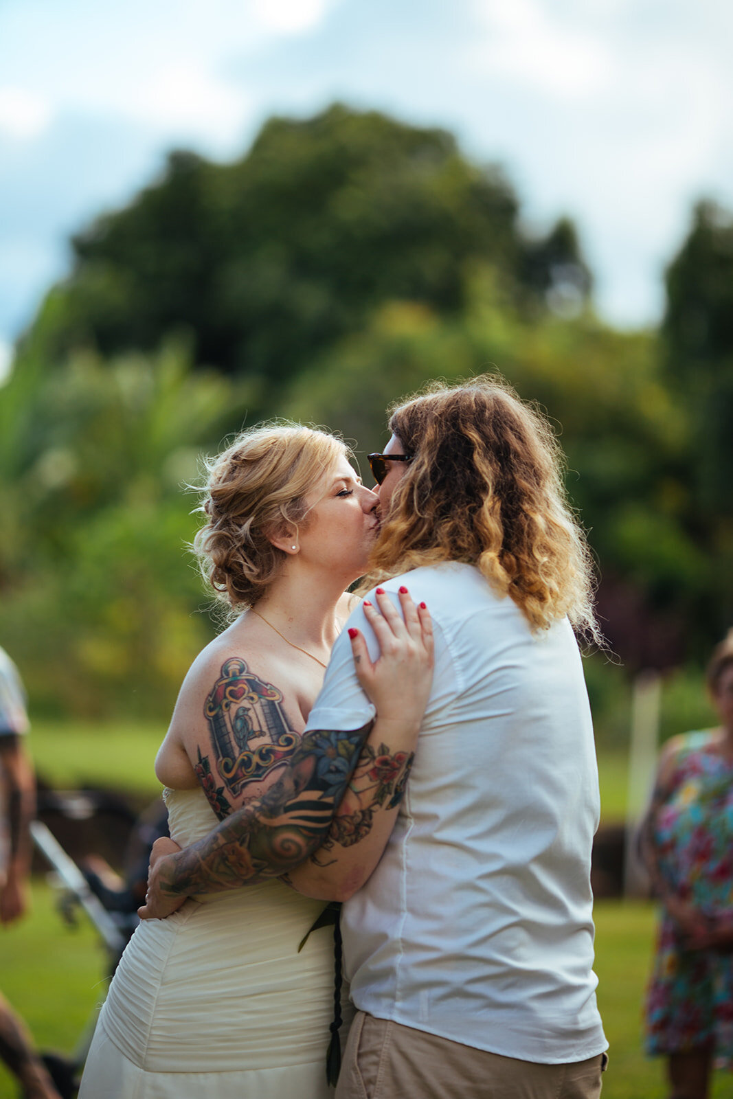 Newlyweds kissing in Kauai Hawaii Shawnee Custalow wedding photography