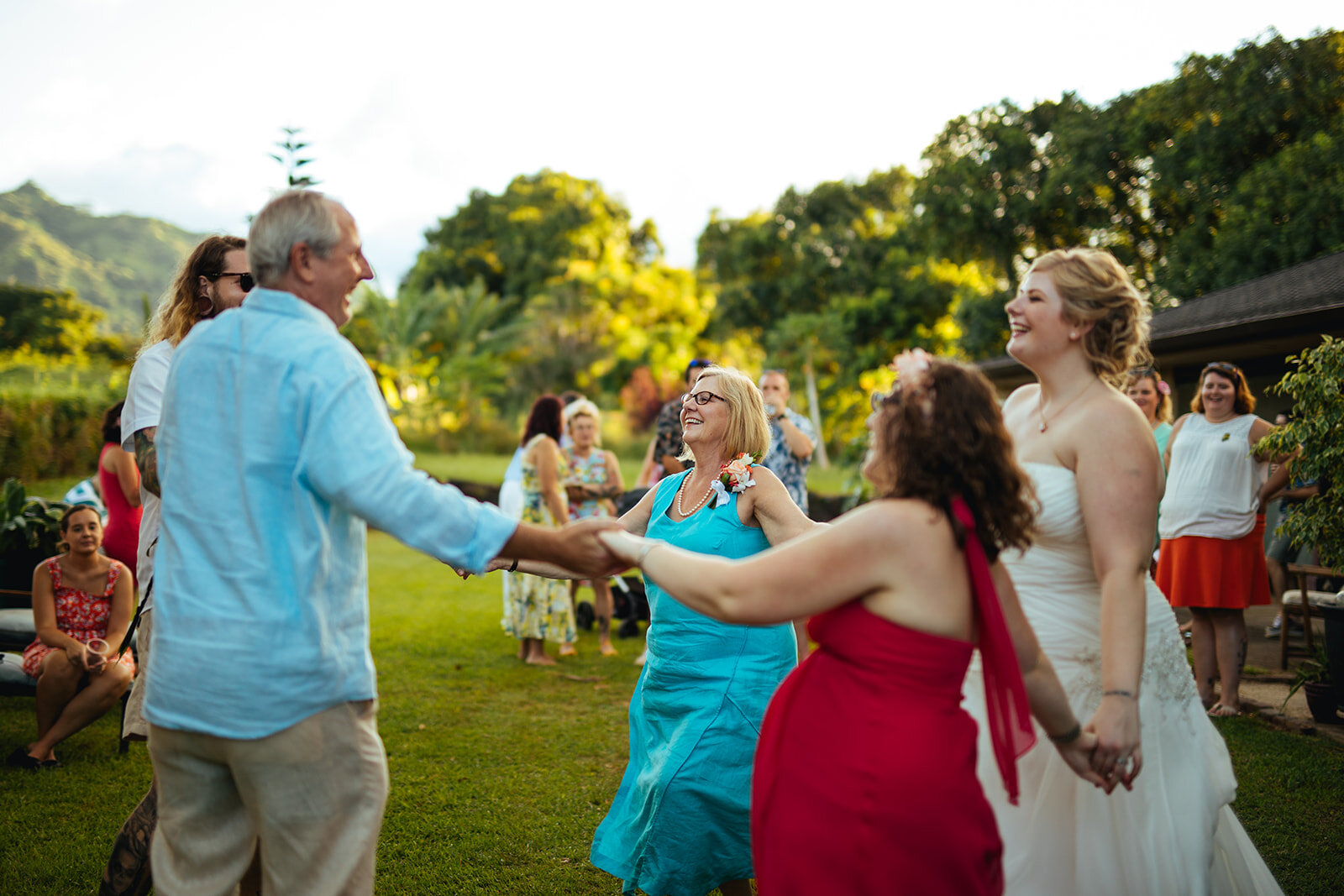 Newlyweds dancing with family in Kauai Hawaii Shawnee Custalow photography