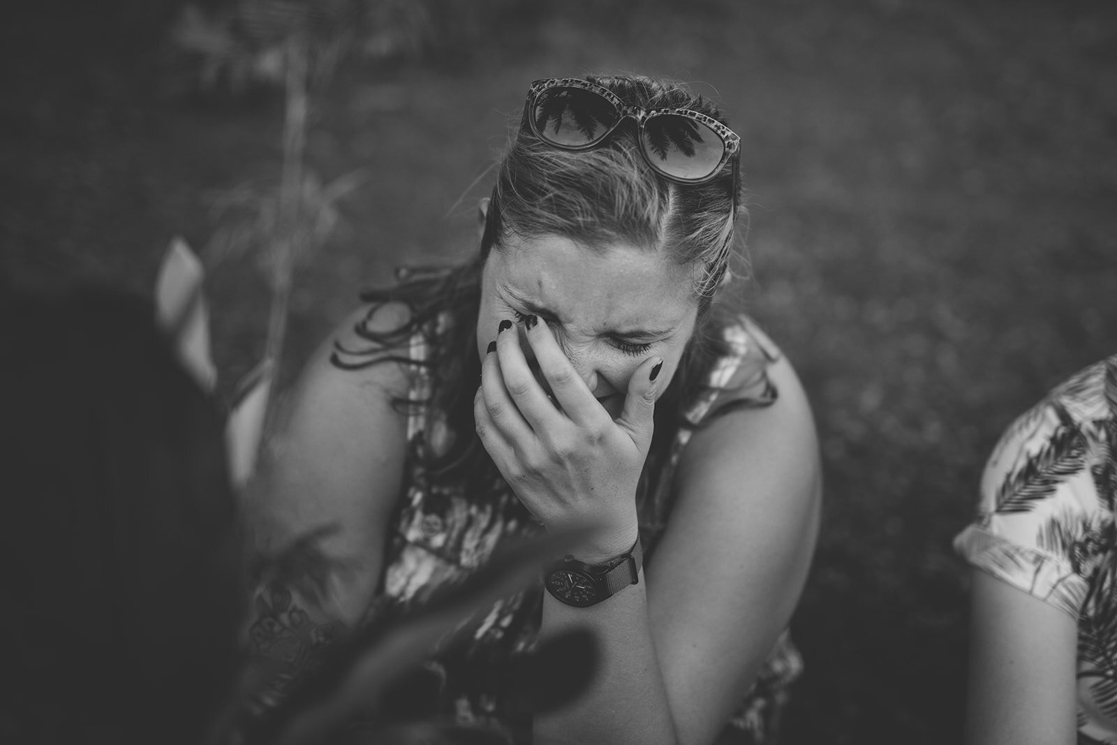 Wedding guest laughing in Kauai Hawaii Shawnee Custalow wedding photography