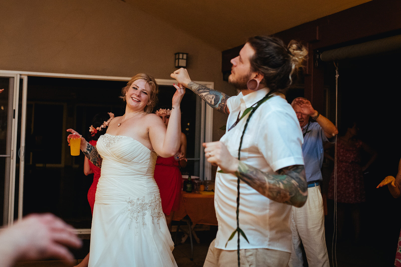 Newlyweds dancing in Kauai Hawaii Shawnee Custalow wedding photographer