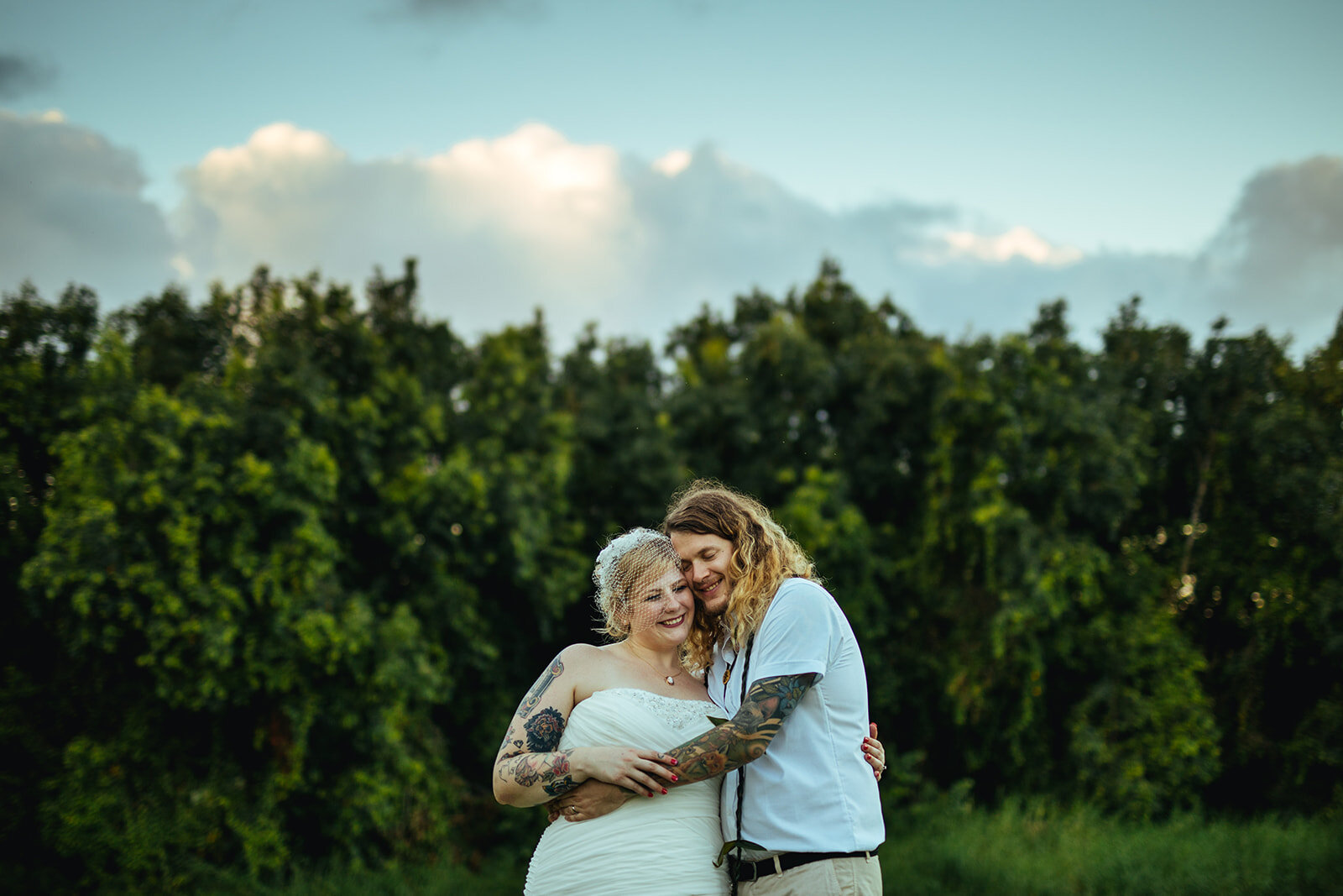 Newlyweds embracing in Kauai Hawaii Shawnee Custalow wedding photography