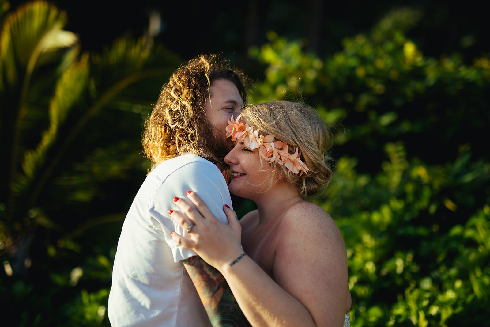 Newlyweds embracing in Kauai Hawaii Shawnee Custalow wedding photography