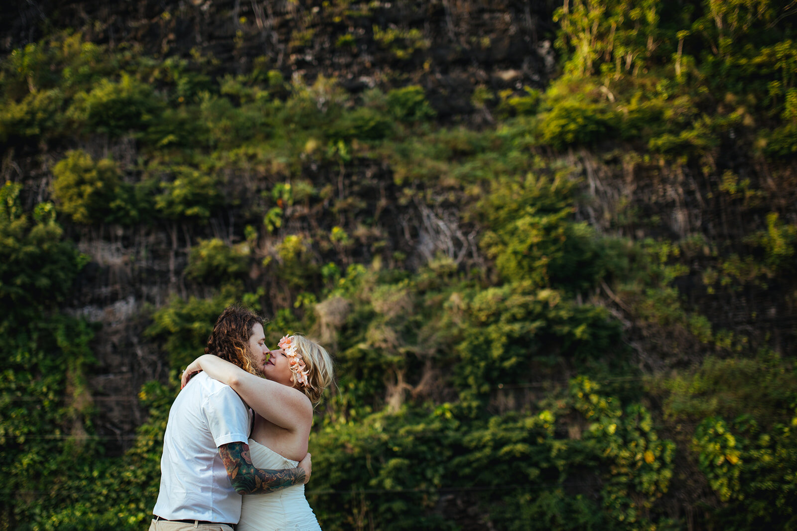 Newlyweds lean in to kiss in Kauai Hawaii Shawnee Custalow wedding photography