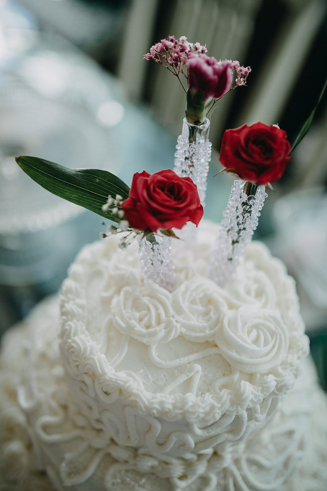 Wedding cake with flowers at Folly Beach Shawnee Custalow photography