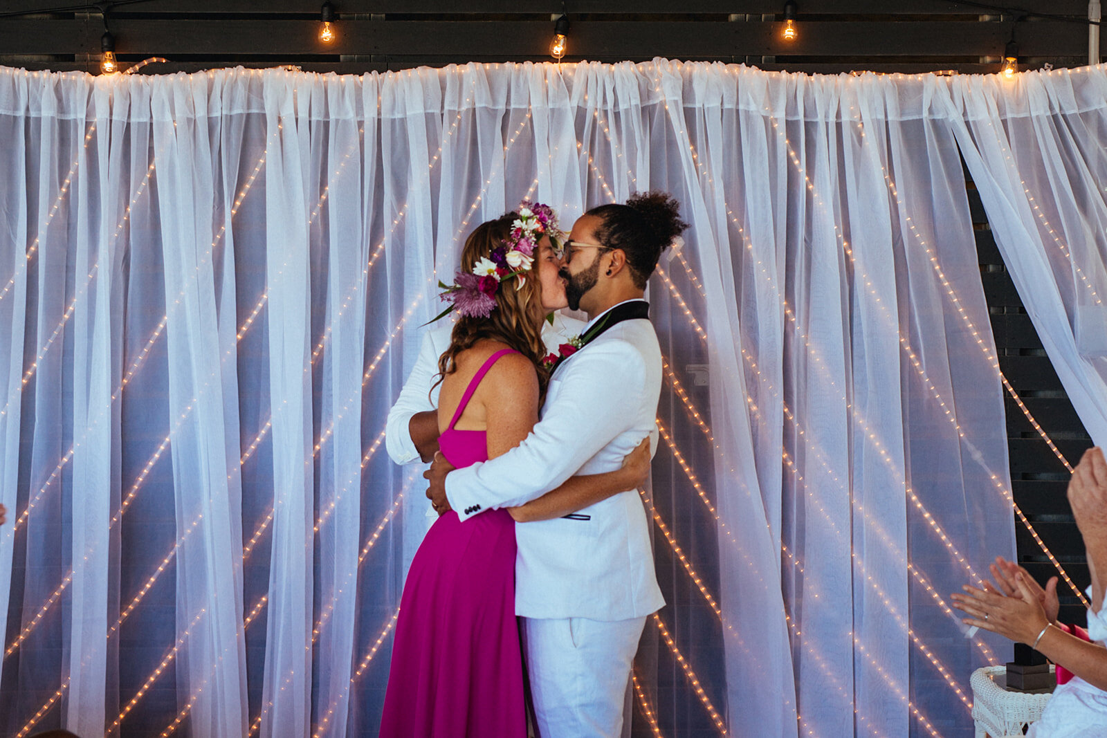 Newlyweds kissing at Folly Beach SC Shawnee Custalow photography