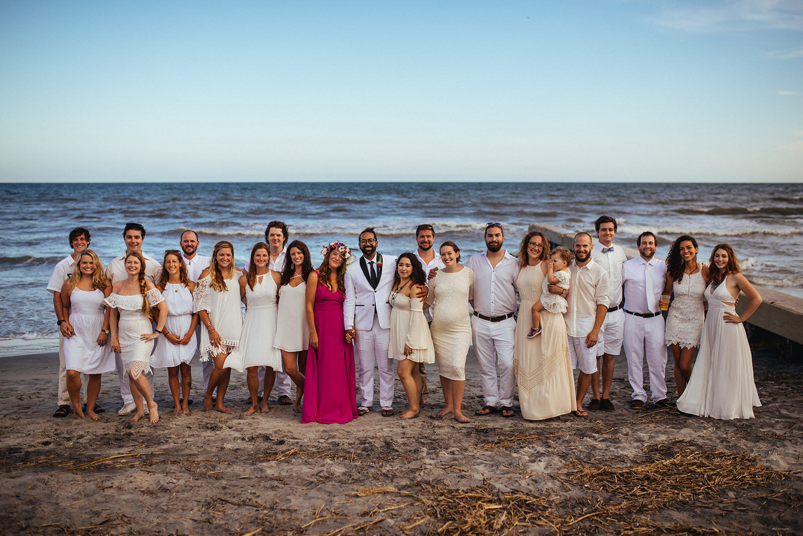 Newlyweds and guests on Folly beach SC Shawnee Custalow photography
